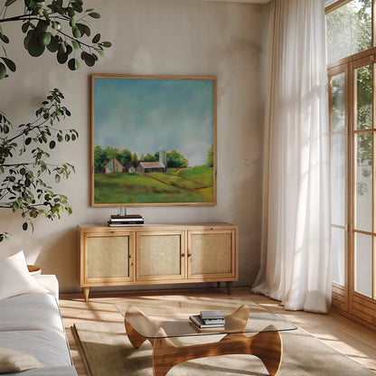 June Farm by Sue Schlabach. Shown in a natural wood frame in a cozy modern living room. Available as an archival giclee rolled canvas, fine art paper, or poster print. SKU 58312a.