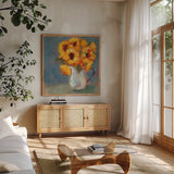 Kitchen Sunflowers by Sue Schlabach. Shown in a natural wood frame in a cozy modern living room. Available as an archival giclee rolled canvas, fine art paper, or poster print. SKU 82701a.
