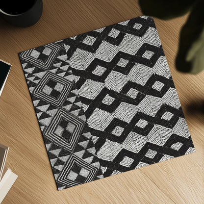 Kuba Cloth Mat I Crop BW by Sue Schlabach. Shown as a detailed flat fine art print, highlighting archival giclee quality. Available as an archival giclee rolled canvas, fine art paper, or poster print. SKU 32129a.