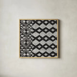 Kuba Cloth Mat I Crop BW by Sue Schlabach. Shown in a natural wood glass frame for a timeless modern aesthetic. Available as an archival giclee rolled canvas, fine art paper, or poster print. SKU 32129a.