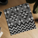 Kuba Cloth Mat II Crop BW by Sue Schlabach. Shown as a detailed flat fine art print, highlighting archival giclee quality. Available as an archival giclee rolled canvas, fine art paper, or poster print. SKU 32130a.