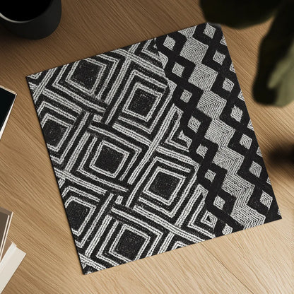 Kuba Cloth Mat III Crop BW by Sue Schlabach. Shown as a detailed flat fine art print, highlighting archival giclee quality. Available as an archival giclee rolled canvas, fine art paper, or poster print. SKU 32131a.