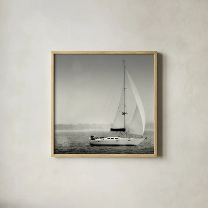 Lake Sail Square I by Sue Schlabach. Shown in a natural wood glass frame for a timeless modern aesthetic. Available as an archival giclee rolled canvas, fine art paper, or poster print. SKU 44565a.