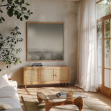 Lake Sail Square IV by Sue Schlabach. Shown in a natural wood frame in a cozy modern living room. Available as an archival giclee rolled canvas, fine art paper, or poster print. SKU 44568a.