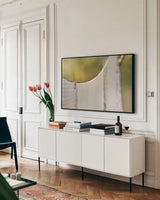 Laundry Day by Sue Schlabach. shown as a framed stretched canvas in a living room above a console. Available as a archival giclee rolled canvas, fine art paper, or poster print. SKU 34129i.