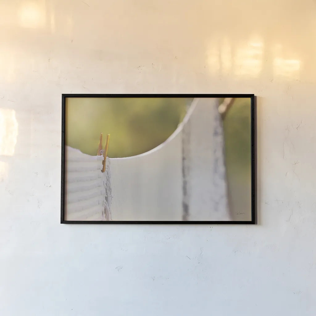 Laundry Day by Sue Schlabach. shown as a paper print in a black flame. Available as a archival giclee rolled canvas, fine art paper, or poster print. SKU 34129i.