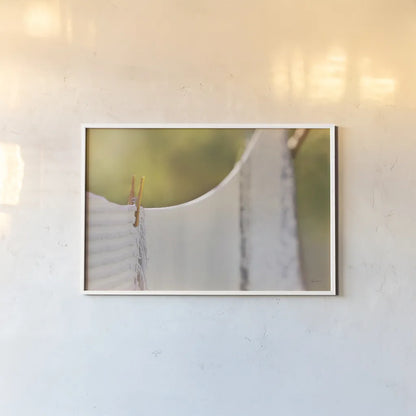 Laundry Day by Sue Schlabach. shown as a paper print in a white frame. Available as a archival giclee rolled canvas, fine art paper, or poster print. SKU 34129i.