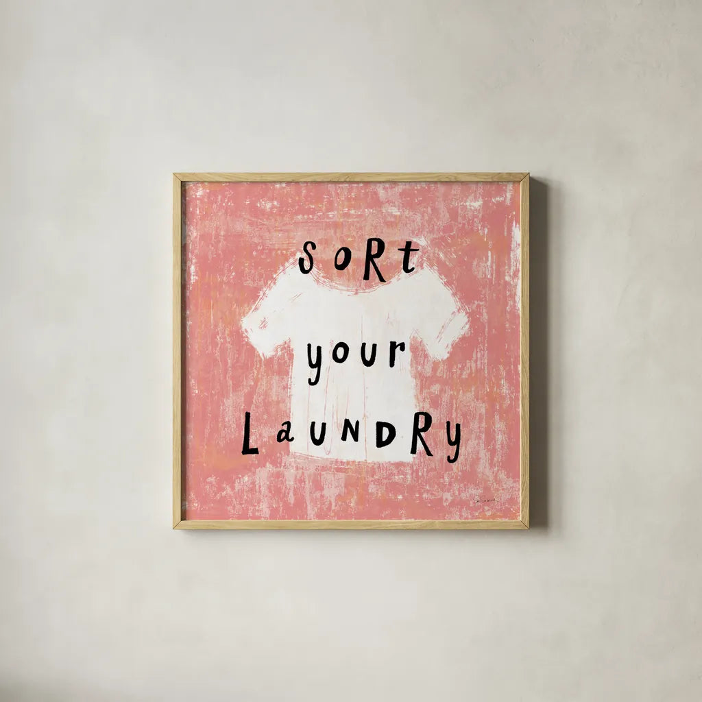 Laundry Rules III by Sue Schlabach. Shown in a natural wood glass frame for a timeless modern aesthetic. Available as an archival giclee rolled canvas, fine art paper, or poster print. SKU 35899a.