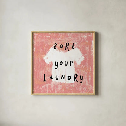Laundry Rules III by Sue Schlabach. Shown in a natural wood glass frame for a timeless modern aesthetic. Available as an archival giclee rolled canvas, fine art paper, or poster print. SKU 35899a.