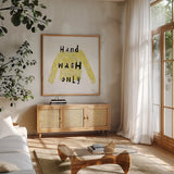 Laundry Rules IV by Sue Schlabach. Shown in a natural wood frame in a cozy modern living room. Available as an archival giclee rolled canvas, fine art paper, or poster print. SKU 35900a.