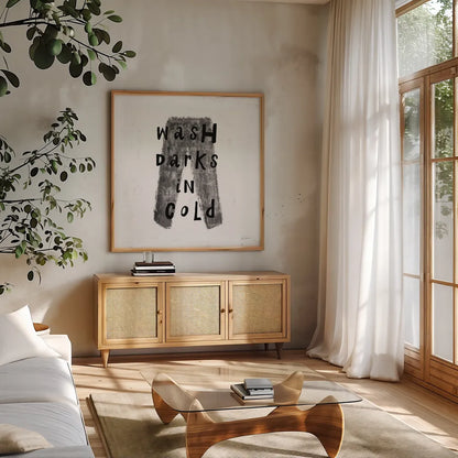 Laundry Rules V BW by Sue Schlabach. Shown in a natural wood frame in a cozy modern living room. Available as an archival giclee rolled canvas, fine art paper, or poster print. SKU 74233a.