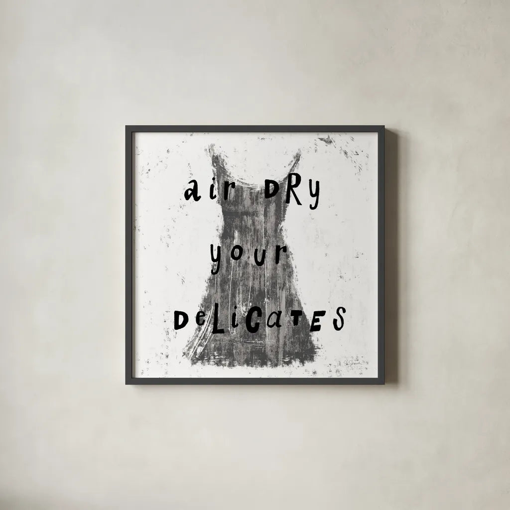 Laundry Rules VI BW by Sue Schlabach. Shown in a sleek black glass frame for a contemporary gallery look. Available as an archival giclee rolled canvas, fine art paper, or poster print. SKU 74234a.