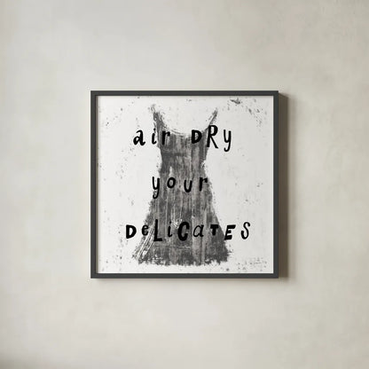 Laundry Rules VI BW by Sue Schlabach. Shown in a sleek black glass frame for a contemporary gallery look. Available as an archival giclee rolled canvas, fine art paper, or poster print. SKU 74234a.