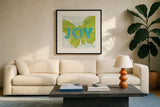 Letterpress Joy by Sue Schlabach. Displayed in a glass frame with matte in a clean modern living room. Available as an archival giclee rolled canvas, fine art paper, or poster print. SKU 11376a.