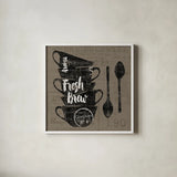 Linen Coffee III by Sue Schlabach. Shown in a crisp white glass frame for a clean and minimalist style. Available as an archival giclee rolled canvas, fine art paper, or poster print. SKU 21876a.