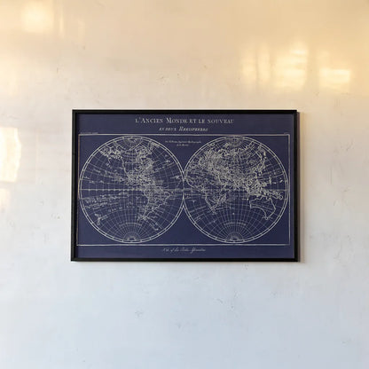 Map of the World Indigo by Sue Schlabach. shown as a paper print in a black flame. Available as a archival giclee rolled canvas, fine art paper, or poster print. SKU 14706i.