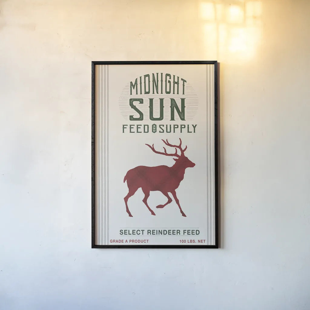 Midnight Sun Reindeer Feed v2 by Sue Schlabach. shown as a paper print in a black flame. Available as a archival giclee rolled canvas, fine art paper, or poster print. SKU 65048h.