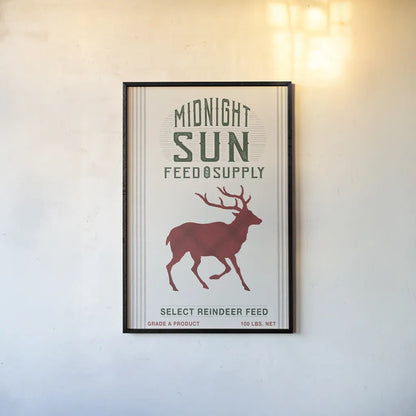 Midnight Sun Reindeer Feed v2 by Sue Schlabach. shown as a paper print in a black flame. Available as a archival giclee rolled canvas, fine art paper, or poster print. SKU 65048h.