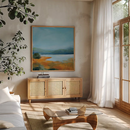Mirror of Sky by Sue Schlabach. Shown in a natural wood frame in a cozy modern living room. Available as an archival giclee rolled canvas, fine art paper, or poster print. SKU 87732a.