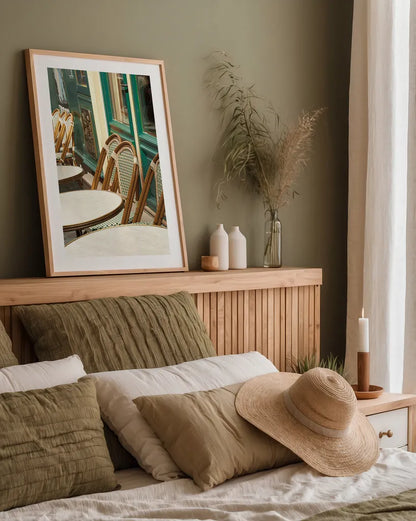 Montmartre Cafe by Sue Schlabach. shown as a paper print in a natural frame. Available as a archival giclee rolled canvas, fine art paper, or poster print. SKU 26499h.