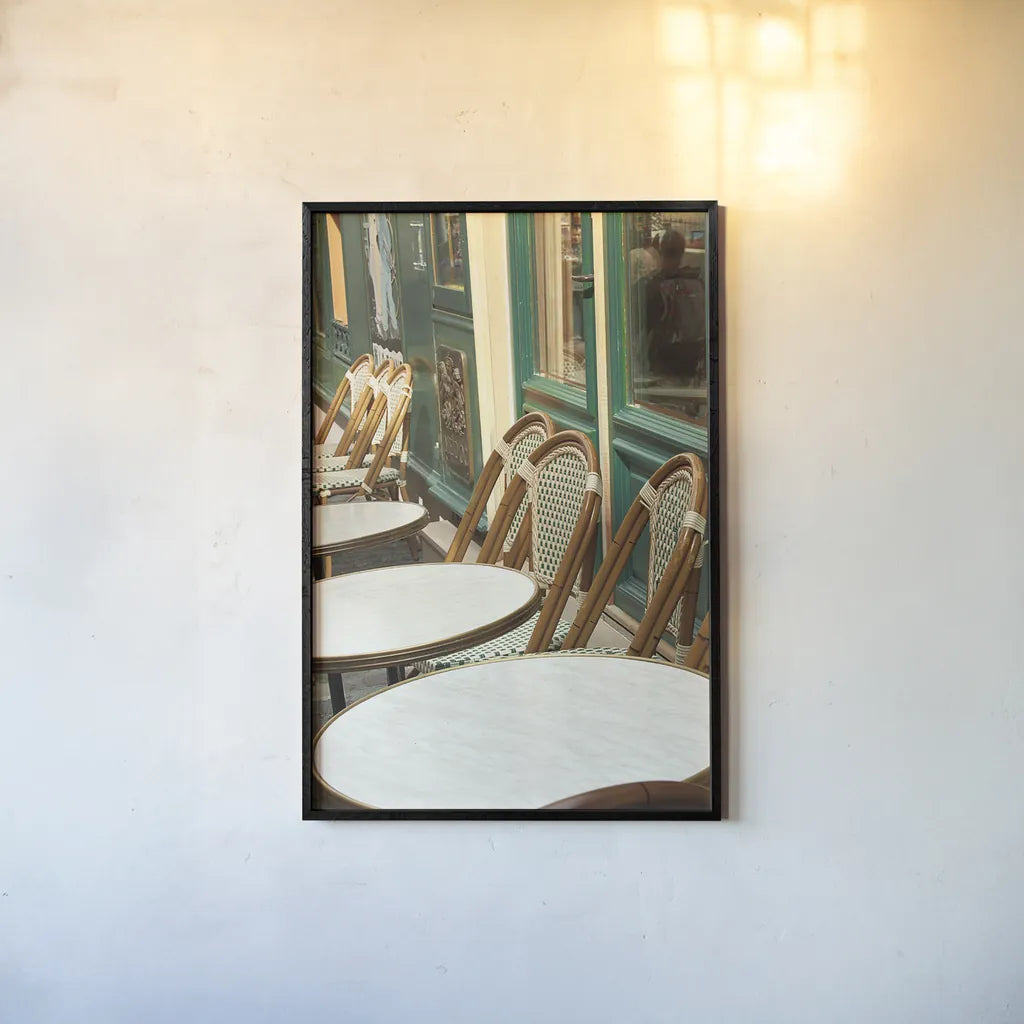 Montmartre Cafe by Sue Schlabach. shown as a paper print in a black flame. Available as a archival giclee rolled canvas, fine art paper, or poster print. SKU 26499h.