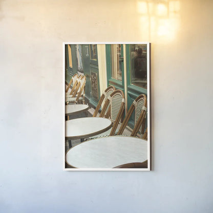Montmartre Cafe by Sue Schlabach. shown as a paper print in a white frame. Available as a archival giclee rolled canvas, fine art paper, or poster print. SKU 26499h.