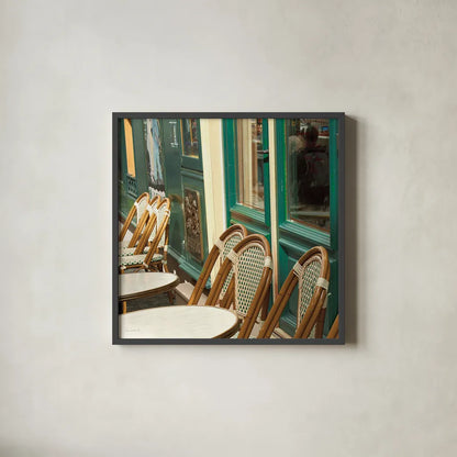 Montmartre Cafe Crop by Sue Schlabach. Shown in a sleek black glass frame for a contemporary gallery look. Available as an archival giclee rolled canvas, fine art paper, or poster print. SKU 26499a.