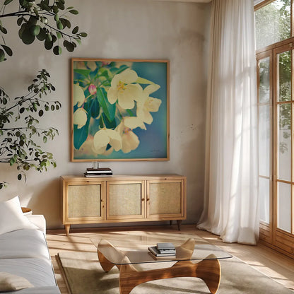 Natures Apple Blossom by Sue Schlabach. Shown in a natural wood frame in a cozy modern living room. Available as an archival giclee rolled canvas, fine art paper, or poster print. SKU 10347a.
