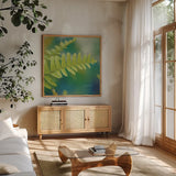 Natures Ferns I No Border by Sue Schlabach. Shown in a natural wood frame in a cozy modern living room. Available as an archival giclee rolled canvas, fine art paper, or poster print. SKU 10496a.