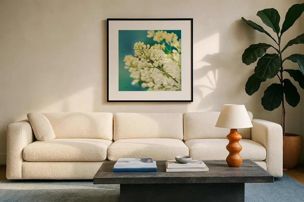 Natures Lilac Blossom by Sue Schlabach. Displayed in a glass frame with matte in a clean modern living room. Available as an archival giclee rolled canvas, fine art paper, or poster print. SKU 10348a.