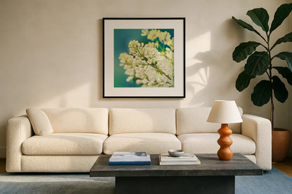 Natures Lilac Blossom by Sue Schlabach. Displayed in a glass frame with matte in a clean modern living room. Available as an archival giclee rolled canvas, fine art paper, or poster print. SKU 10348a.