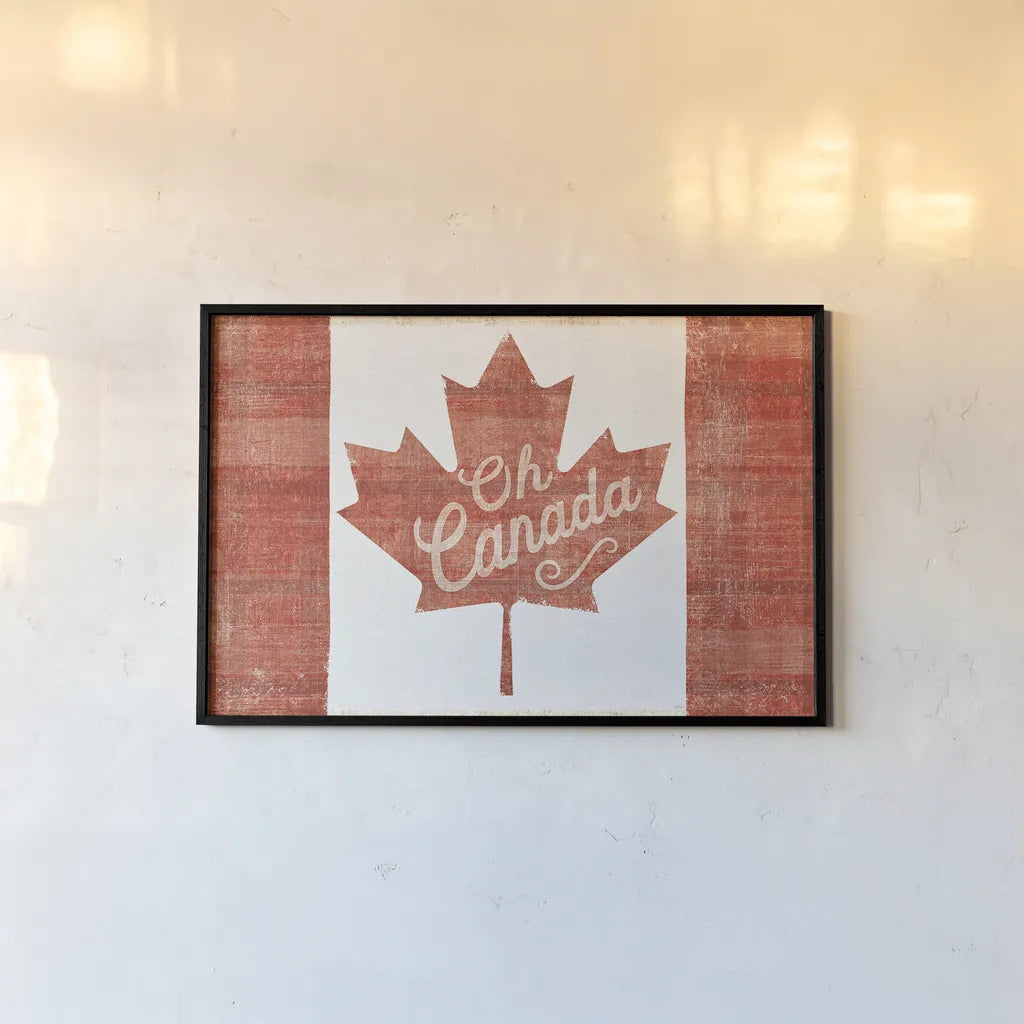 Oh Canada Flag by Sue Schlabach. shown as a paper print in a black flame. Available as a archival giclee rolled canvas, fine art paper, or poster print. SKU 30820i.