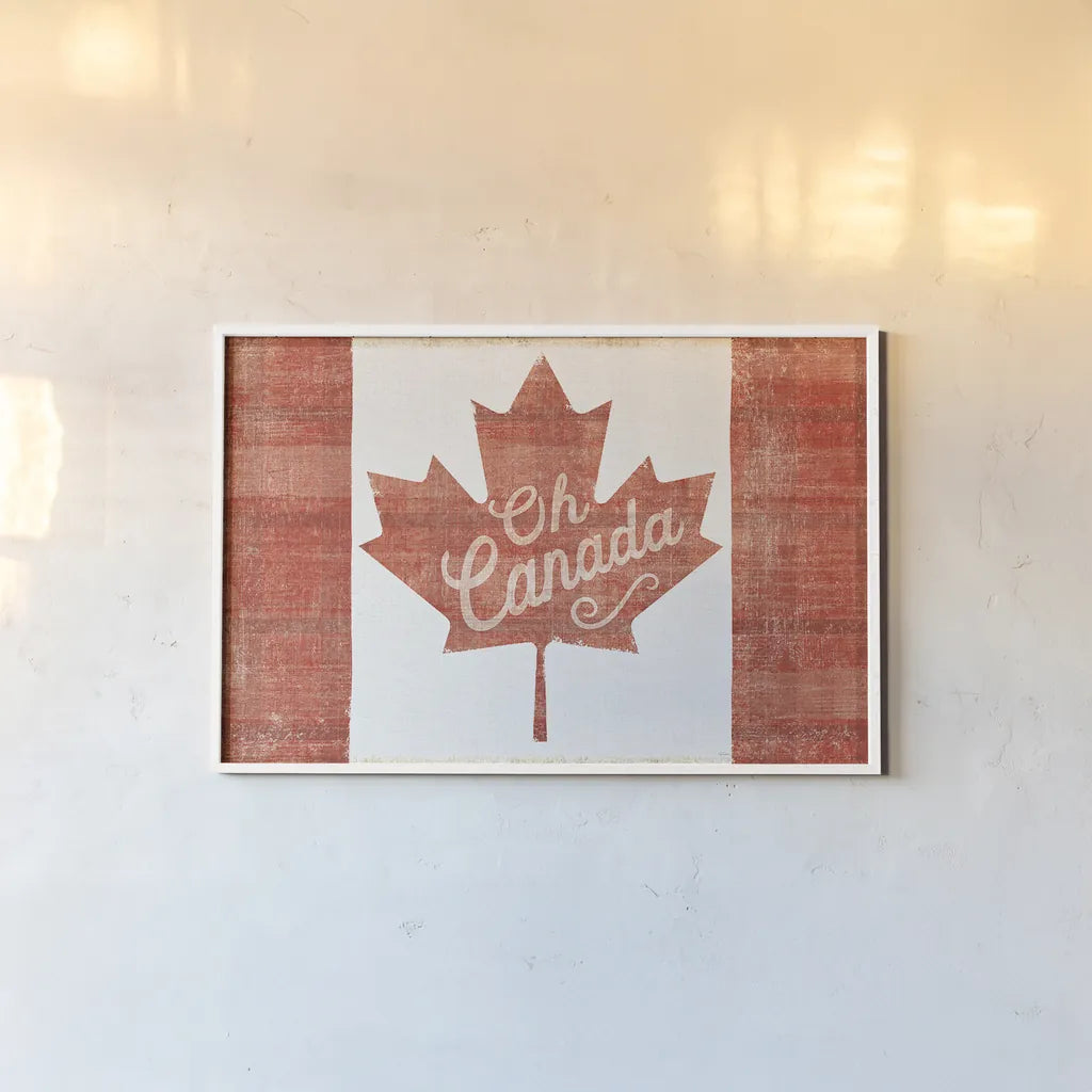 Oh Canada Flag by Sue Schlabach. shown as a paper print in a white frame. Available as a archival giclee rolled canvas, fine art paper, or poster print. SKU 30820i.