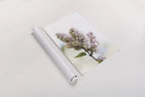Pale Lilacs II by Sue Schlabach. shown as a rolled paper print. Available as archival giclee rolled canvas, fine art paper, or poster print. SKU 72130i.