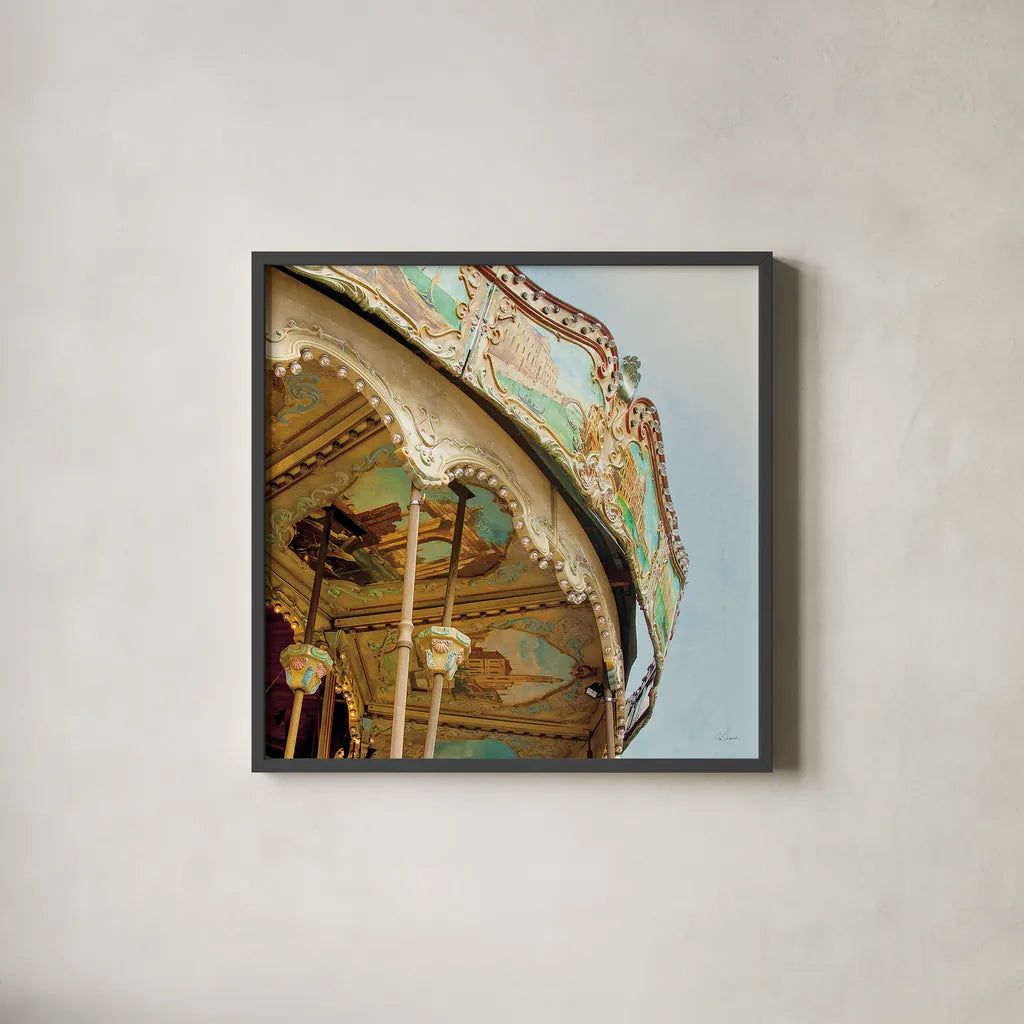 Paris Carousel I Aged by Sue Schlabach. Shown in a sleek black glass frame for a contemporary gallery look. Available as an archival giclee rolled canvas, fine art paper, or poster print. SKU 34160a.