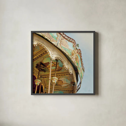 Paris Carousel I Aged by Sue Schlabach. Shown in a sleek black glass frame for a contemporary gallery look. Available as an archival giclee rolled canvas, fine art paper, or poster print. SKU 34160a.