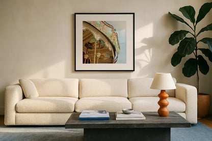 Paris Carousel I Aged by Sue Schlabach. Displayed in a glass frame with matte in a clean modern living room. Available as an archival giclee rolled canvas, fine art paper, or poster print. SKU 34160a.
