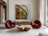 Paris Carousel I Aged by Sue Schlabach. Shown as extra-large giant wall art in a modern living room. Available as an archival giclee rolled canvas, fine art paper, or poster print. SKU 34160a.