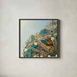 Paris Carousel II Aged by Sue Schlabach. Shown in a sleek black glass frame for a contemporary gallery look. Available as an archival giclee rolled canvas, fine art paper, or poster print. SKU 34161a.