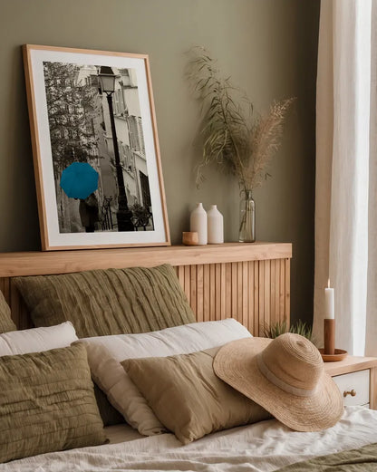Paris Stroll II Teal Umbrella by Sue Schlabach. shown as a paper print in a natural frame. Available as a archival giclee rolled canvas, fine art paper, or poster print. SKU 44745h.