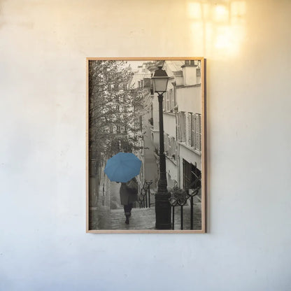 Paris Stroll II Teal Umbrella by Sue Schlabach. shown as a paper print in a natural frame. Available as a archival giclee rolled canvas, fine art paper, or poster print. SKU 44745h.