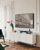 Paris in the Rain III by Sue Schlabach. shown as a framed stretched canvas in a living room above a console. Available as a archival giclee rolled canvas, fine art paper, or poster print. SKU 41085i.