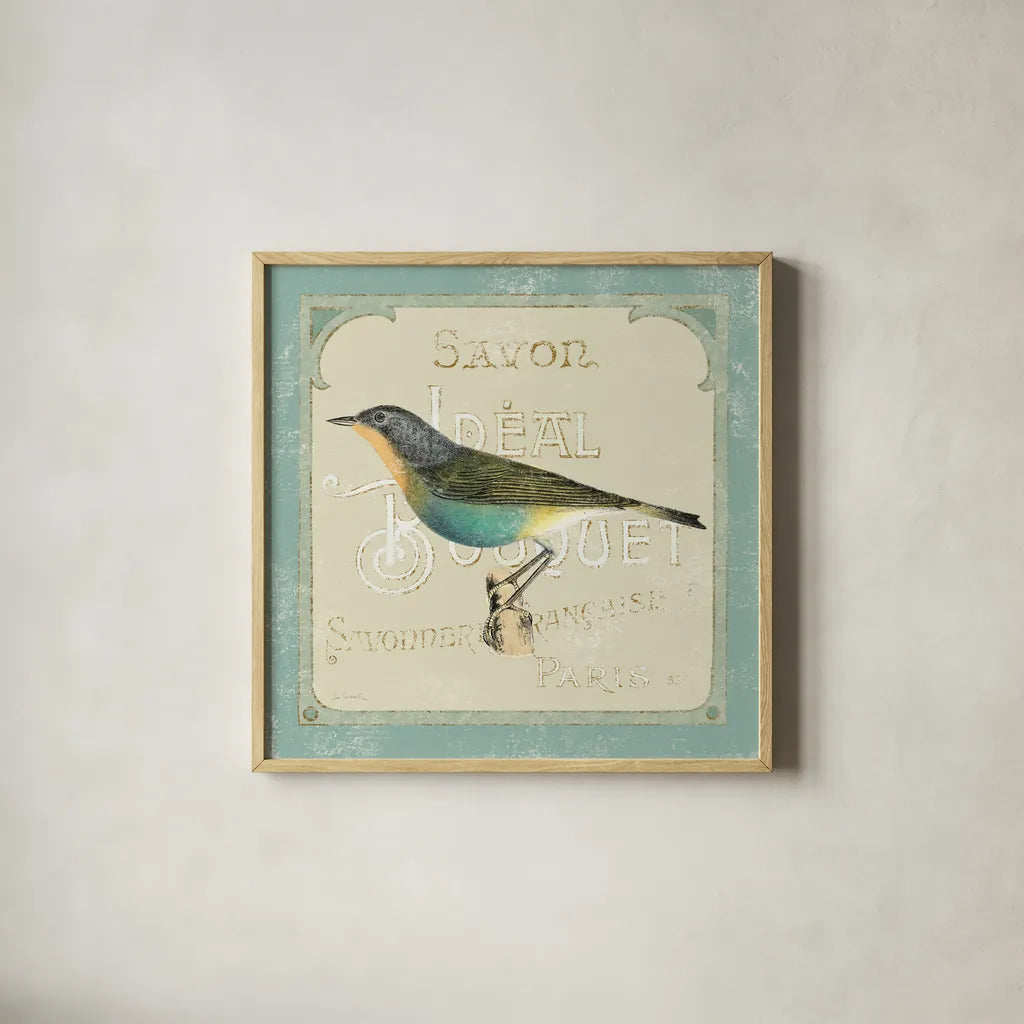 Parisian Bird II by Sue Schlabach. Shown in a natural wood glass frame for a timeless modern aesthetic. Available as an archival giclee rolled canvas, fine art paper, or poster print. SKU 9076a.