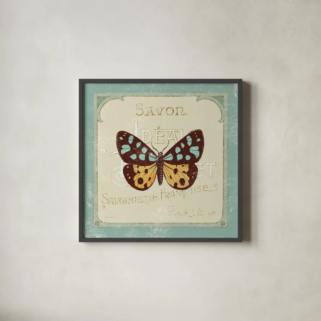 Parisian Butterfly I by Sue Schlabach. Shown in a sleek black glass frame for a contemporary gallery look. Available as an archival giclee rolled canvas, fine art paper, or poster print. SKU 9077a.