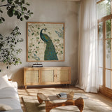 Peacock Arbor II Ivory Sq by Sue Schlabach. Shown in a natural wood frame in a cozy modern living room. Available as an archival giclee rolled canvas, fine art paper, or poster print. SKU 16060a.
