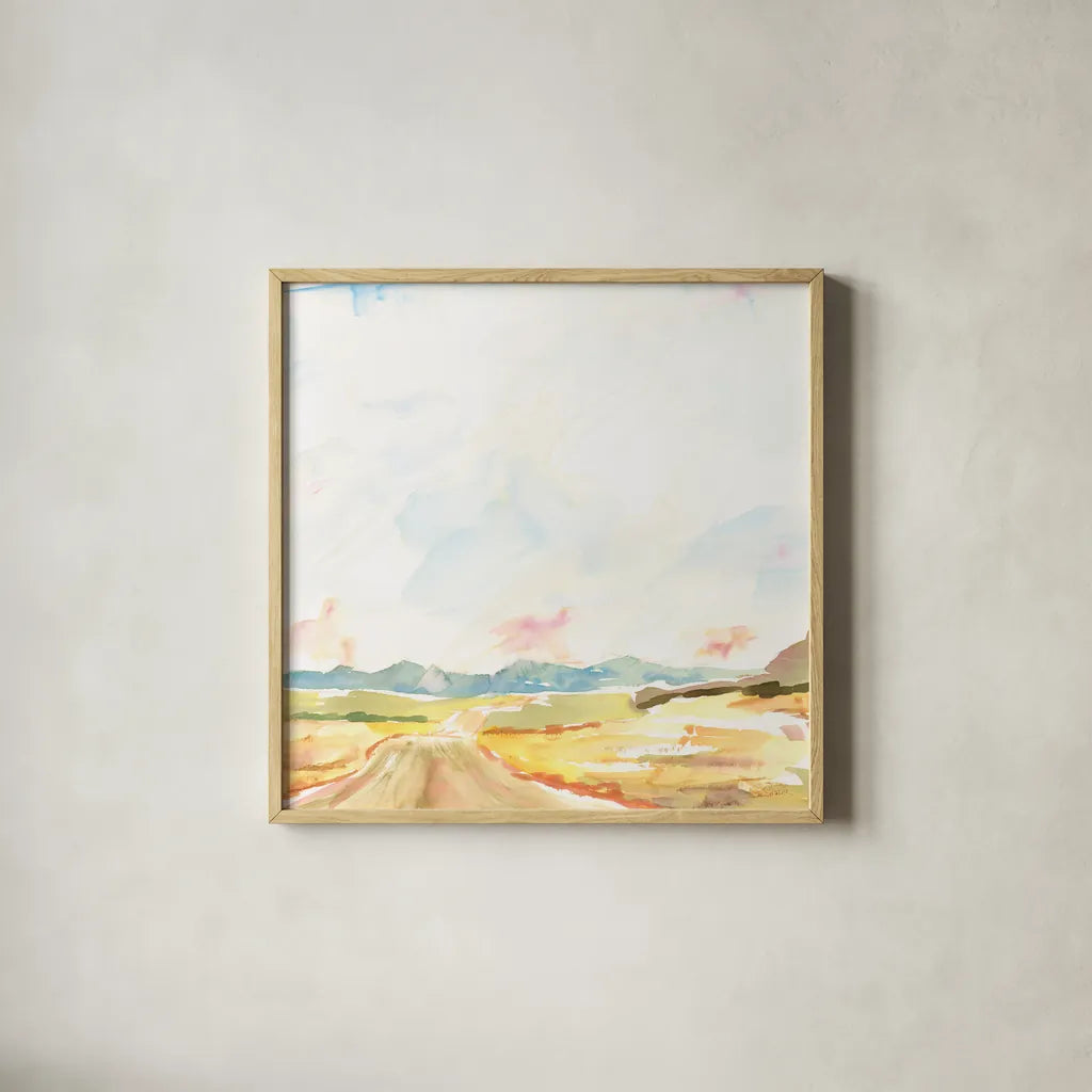 Road to Bountiful Square by Sue Schlabach. Shown in a natural wood glass frame for a timeless modern aesthetic. Available as an archival giclee rolled canvas, fine art paper, or poster print. SKU 63747a.