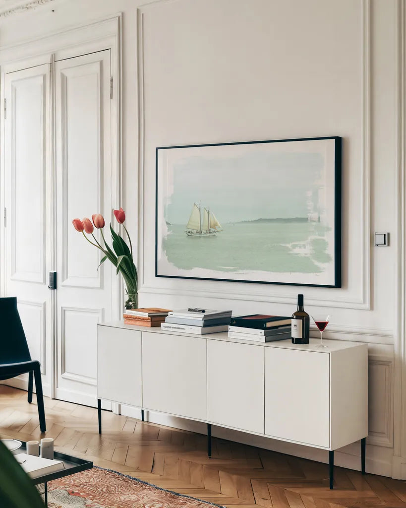 Sailing on the Bay by Sue Schlabach. shown as a framed stretched canvas in a living room above a console. Available as a archival giclee rolled canvas, fine art paper, or poster print. SKU 47304i.
