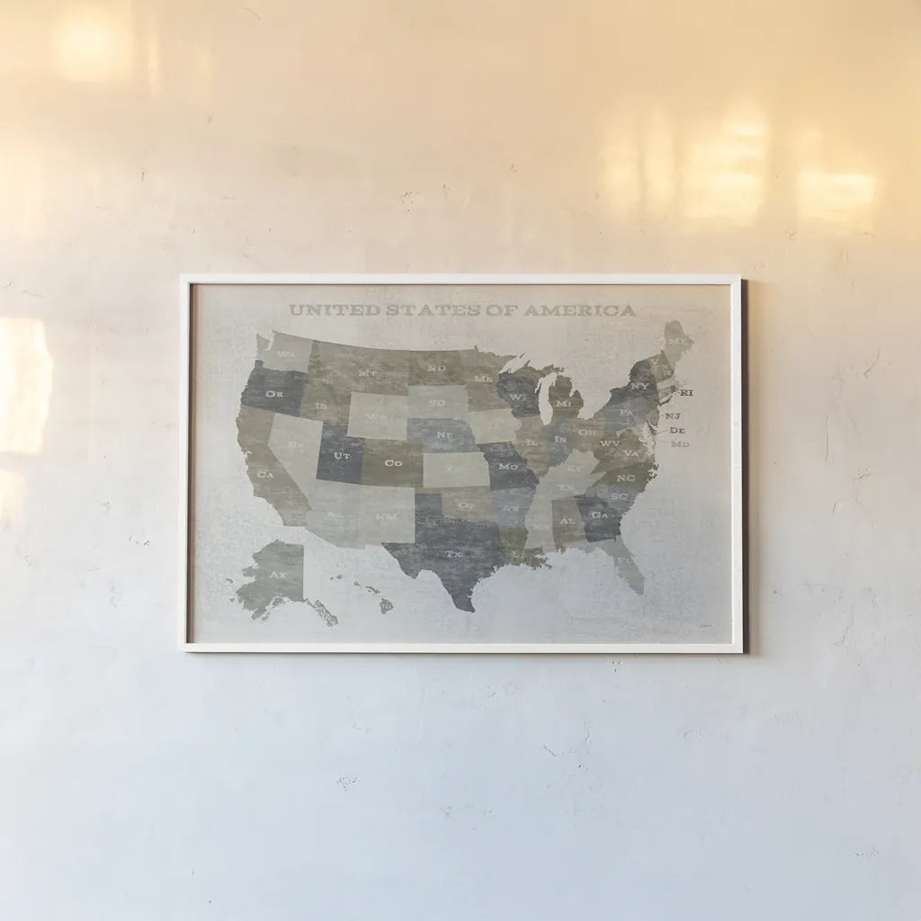 Slate US Map by Sue Schlabach. shown as a paper print in a white frame. Available as a archival giclee rolled canvas, fine art paper, or poster print. SKU 57293i.