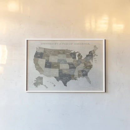 Slate US Map by Sue Schlabach. shown as a paper print in a white frame. Available as a archival giclee rolled canvas, fine art paper, or poster print. SKU 57293i.