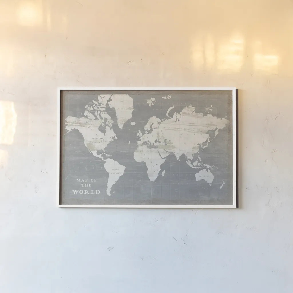 Slate World Map by Sue Schlabach. shown as a paper print in a white frame. Available as a archival giclee rolled canvas, fine art paper, or poster print. SKU 51520i.